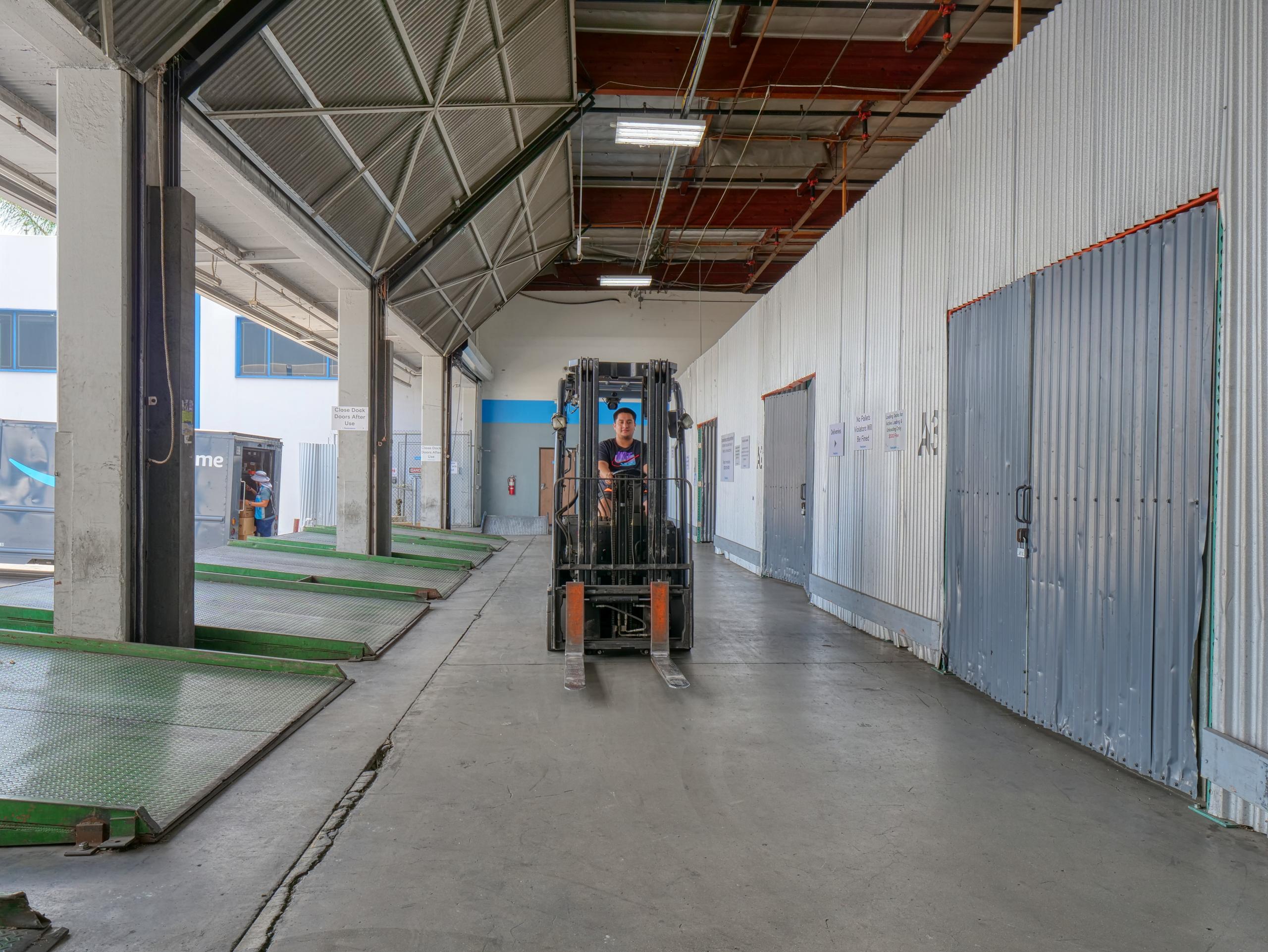Loading dock with forklift in South Gate, CA