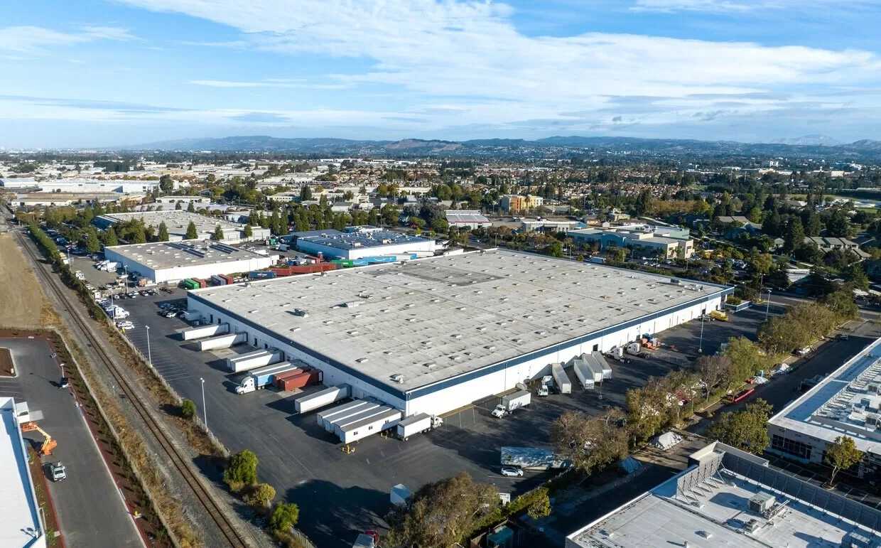 An aerial view of a large warehouse in Hayward, California.