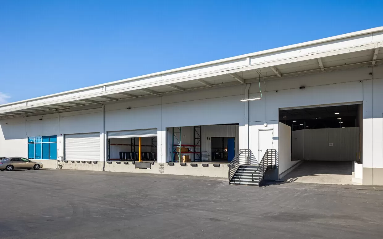 A large ReadySpaces warehouse with a car parked in front of it in South San Francisco